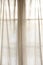 Sheer fabric window curtain with filtered light