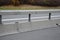 Sheet metal movable center barrier on the highway. serves as an easily relocatable interface in the opposite direction during road