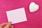 Sheet of paper for inscription on pink background