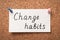 Sheet of paper with phrase Change Habits pinned to corkboard