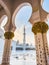 Sheikh Zayed Grand Mosque hallway corridor during sunset, in Abu Dhabi, United Arab Emirates