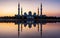 Sheikh Zayed Grand Mosque reflected on the water in Abu Dhabi emirate of UAE
