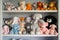 shelf with a collection of plush animals in a baby room