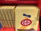Shelf display with Tokyo Banana Kit Kats candy bars on sale, in a gift box at a gift shop
