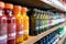 A shelf displaying glass bottles filled with colorful liquids