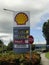Shell gas station in the center of Koror with the gas prices from 2017 less than $5. Sunny daylight view.