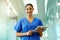 Shell help you protect your greatest asset your health. Portrait of a young nurse using a tablet while standing inside a