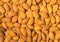 Shelled almond kernels background