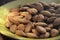 Shelled almonds Prunus dulcis, Prunus amygdalus on a plate. Closeup view