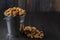 Shelled walnuts in a metal bucket