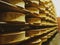 Shelves with appetizing ready-made cheese in the cellar at a small cheese dairy