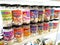 Shelves with Assortment of baby food of various manufacturers in the store for sale.