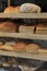 Shelves filled with freshly baked loaves of bread