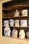 Shelves filled with stone crockery from historic Huguenot Street, New York, 2018