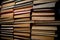 Shelves with old books. Stacks of textbooks with red, blue, green covers and paper sheets with shadow in a dark library