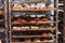 Shelves with pastries. Sweet croissants and buns.