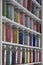 Shelving with glass jars of colorful pigments