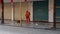 Shenzhen, China: female sanitation workers cleaning rubbish in the streets