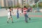 Shenzhen, China: Kids playing basketball