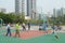Shenzhen, China: Kids playing basketball