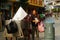 Shenzhen, China: a man picking up trash