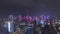 SHENZHEN, CHINA - MARCH 30, 2019: Urban Skyline and Light Show. Futian District. Aerial View. Reveal Shot. Drone Flies