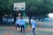 Shenzhen, China: middle school students playing basketball