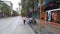 Shenzhen, China: prevent and combat new coronavirus pneumonia, street view, a small number of pedestrians, all wearing masks, and