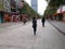 Shenzhen, China: prevent and combat new coronavirus pneumonia, street view, a small number of pedestrians, all wearing masks, and