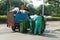 Shenzhen, China: sanitation workers in garbage removal