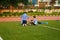 Shenzhen, China: students play on the football field lawn