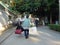 Shenzhen, China: women carry luggage on their way home