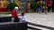 Shenzhen, China: Women`s parents take their children to play in the park