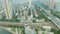 Shenzhen city and passing train. China. Aerial view