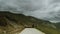 shepherd drives on the mountain route an attara of sheep, the desert mountain area, Gazakh Azerbaijan green field