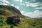 Shepherd`s house surrounded by mountains