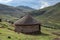 Shepherd`s mud hut in the hills near the town of Mokhotlong in north eastern Lesotho, Africa.