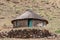 Shepherd`s mud hut in the hills near the town of Mokhotlong in north eastern Lesotho, Africa.
