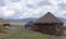 Shepherd`s mud huts in the hills near the town of Mokhotlong in north eastern Lesotho, Africa.