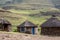 Shepherd`s mud huts in the hills near the town of Mokhotlong in north eastern Lesotho, Africa.