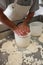 Shepherds prepare ricotta cheese with fresh sheep`s milk