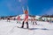 Sheregesh, Kemerovo region, Russia - April 13, 2019 : Crowd of people in bikini and shorts riding snowboard and mountain