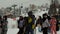 Sheregesh, Russia - 07 March, 2019: Slow motion of a group of snowboarders at a ski resort.