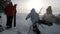 Sheregesh, Russia - 07 March, 2019: Slow motion of men with snowboards and skis climb to the top of a mountain in a