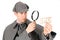 Sherlock: Curious Detective Looks at Money With Magnifying Glass