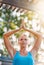 Shes becoming a symbol of peace. Closeup shot of a mature woman doing yoga exercises outside her house in the morning.