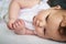 Shes a bundle of cuteness. an adorable baby girl lying down on the bed at home.