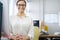 Shes the consummate young professional. Portrait of a young woman sitting at her desk in an office.