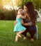 Shes eager for a day of outdoor play. a mother bonding with her adorable little daughter outside.