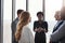 Shes excited to share her ideas. a group of corporate businesspeople meeting in their boardroom.